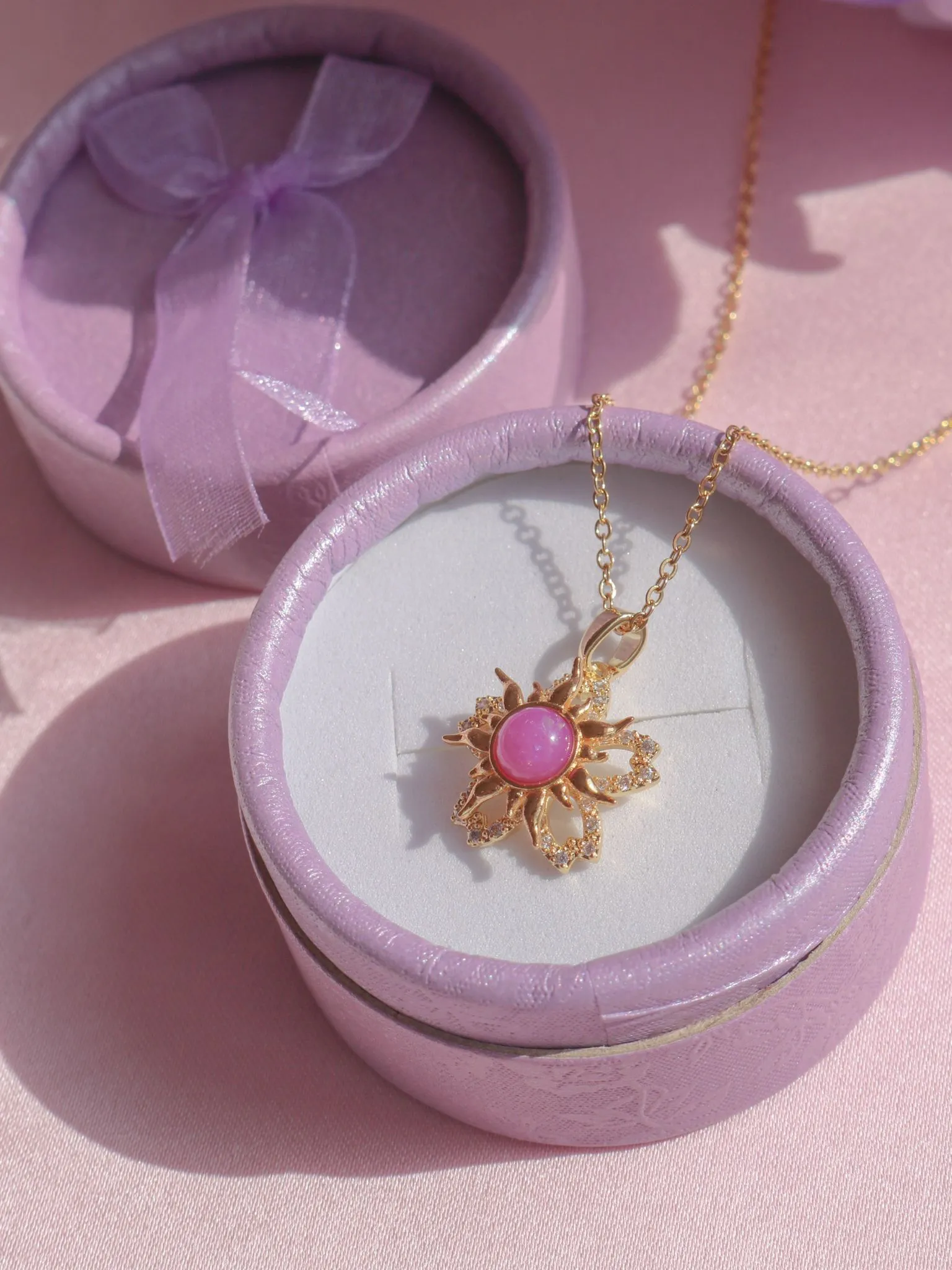 Rapunzel Sundrop Flower Spinning Necklace